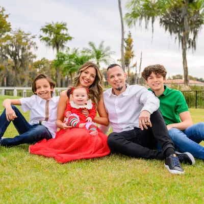 The Tremonti family posing for a photo outdoors