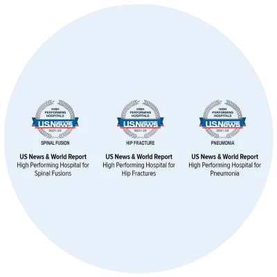 Three US News award logos within a circle