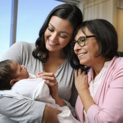 Mother and Grandmother holding a baby