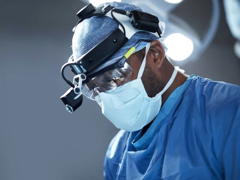 A doctor conducting a surgery.