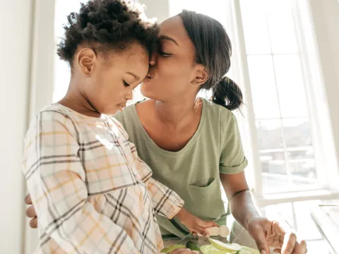 Mother comforting child in a time of need.