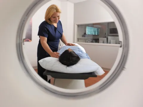 Woman preparing for an MRI