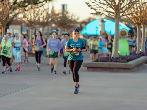 Woman running the runDisney Princess 10k.