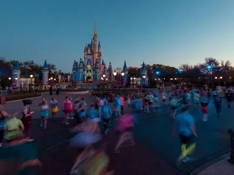 Runners running runDisney Princess Half Marathon at the Magic Kingdom.