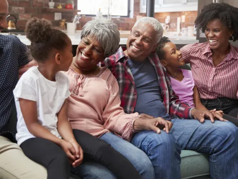 A happy family celebrates a quick surgery recovery together.