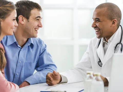 Young couple discussing medical care