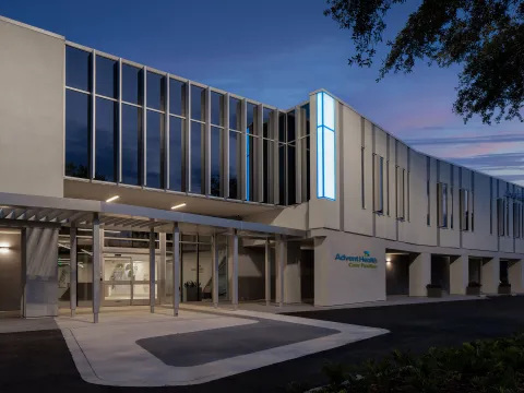 AdventHealth New Tampa Care Pavilion at night.