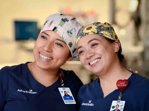 Two AdventHealth nurses smiling together