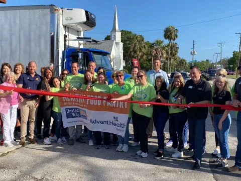 Leaders and volunteers from AdventHealth, United Way of Central Florida, Hands for the Homeless and the community worked together to distribute more than 9400 pounds of food to people in need
