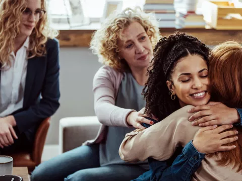 women support each other in a breast cancer support group