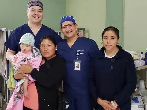 a group photo with a baby