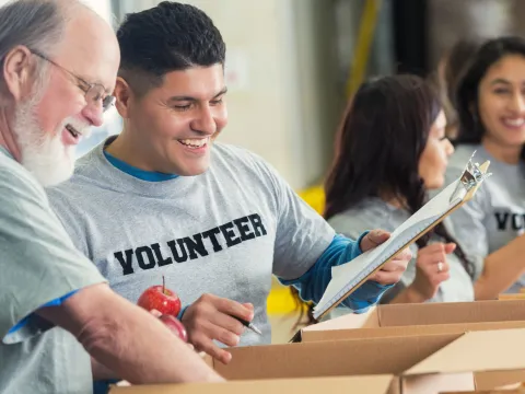 A group of volunteers organize donations. 