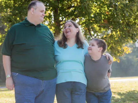 Family walking in the park.