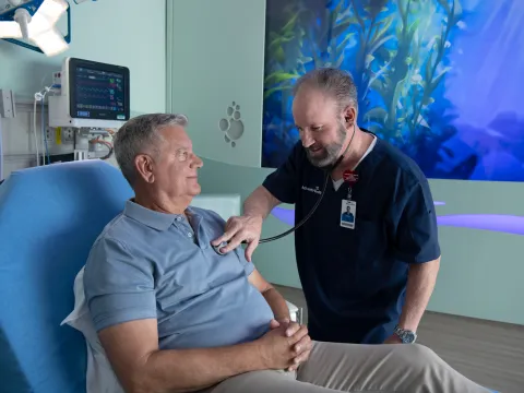 A Physician Listens to a Patient's Heart at AdventHealth Flamingo Crossing Town Center