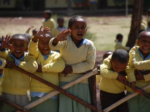 Group of Kids Waving