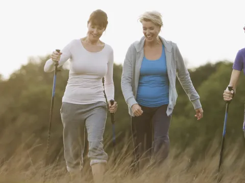 Happy women hiking together