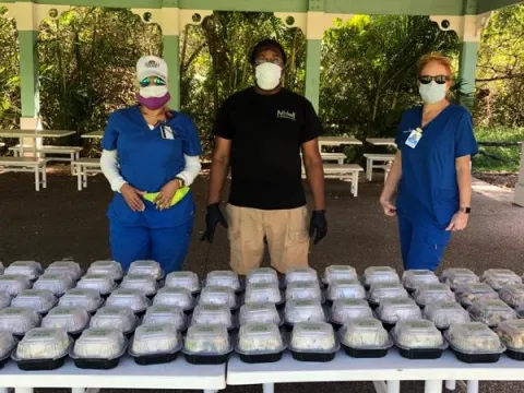 Healthcare workers with food donations