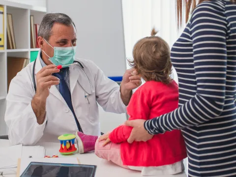 Child seeing pediatrician.