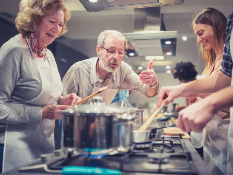 A group attends a cooking class.