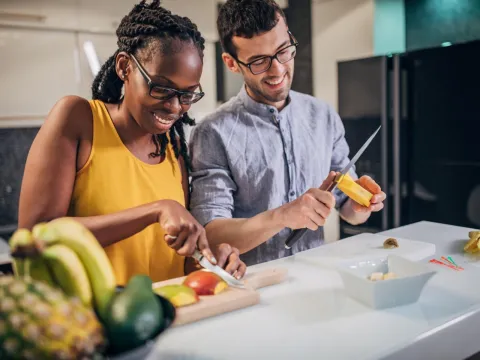 two adults prepare a health supper for diabetes