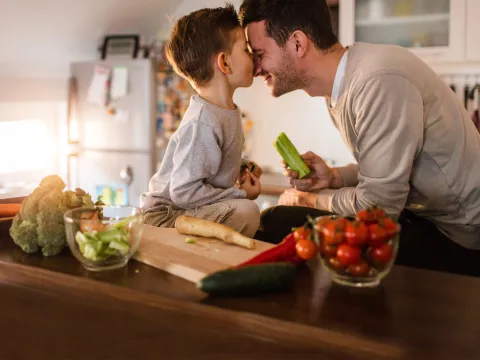 Dad and son in the kitchen.