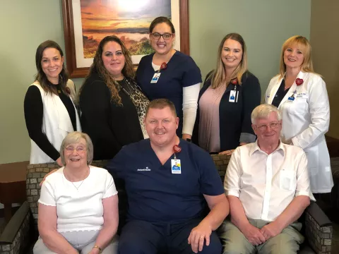 Irene and Peter Ferguson reunite with nurse Greg Prince and other members of the care team.