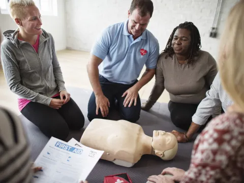 A group gets trained in CPR.