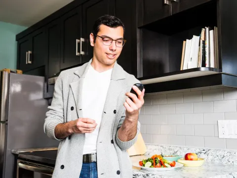 man checks his insulin