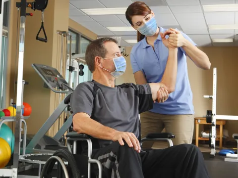 A man doing physical therapy. 