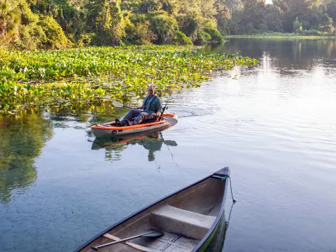 Man paddling a kayak