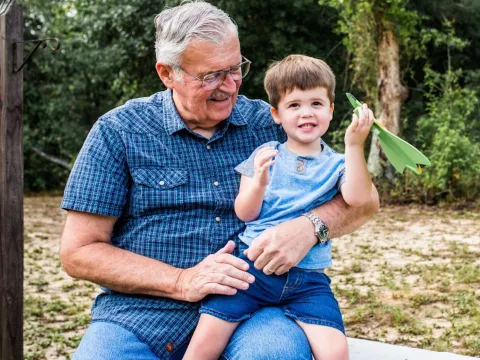 Shane Matthews with his grandson.