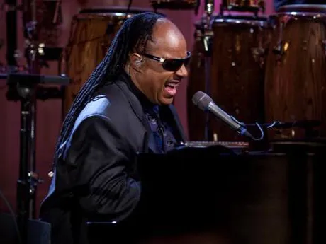 Stevie Wonder performs on stage.