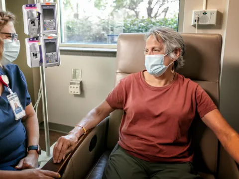 A woman getting infusion therapy.