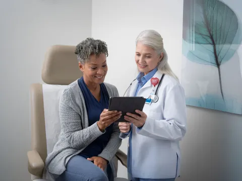 AdventHealth doctor showing results to a patient