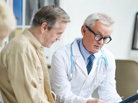 doctor talking to patient