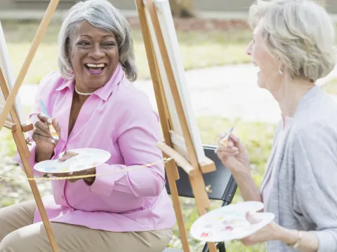 Two women take an art class together in retirement.