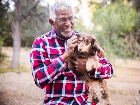 A man walking his dog.