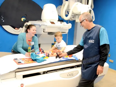 Pediatric Radiology/Imaging Patient with Two Providers Preparing to Take Some Imaging