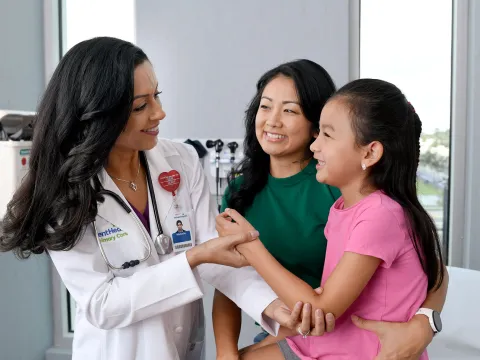 Doctor check Childs wrist