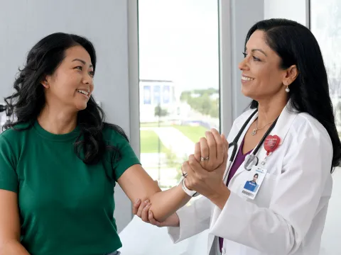 Female doctor with patient.