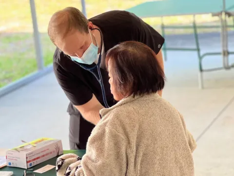 Family Medicine Residency team member with patient