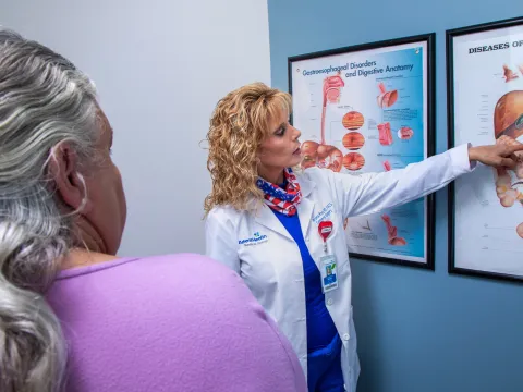 Sharona Ross showing patient diagram at an appointment at the AdventHealth Digestive Health Institute.