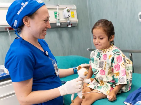 A doctor with a young female patient