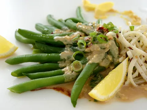 Vegetable dish with tahini and honey infused green beans