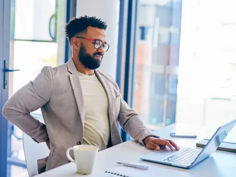 whi-back-pain-at-work