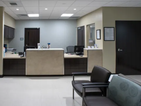 Lobby with desk and chairs