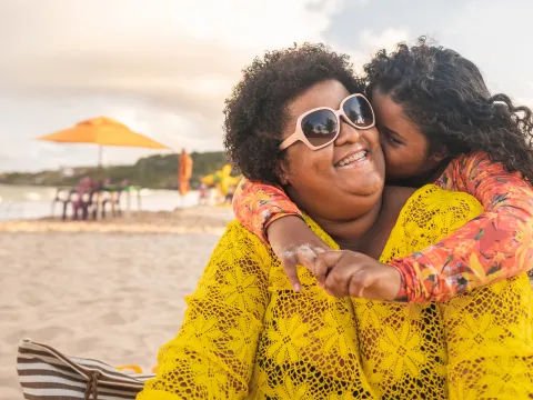 Woman and Girl at the beach.