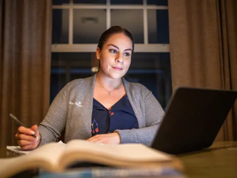 Woman Studying on a laptop