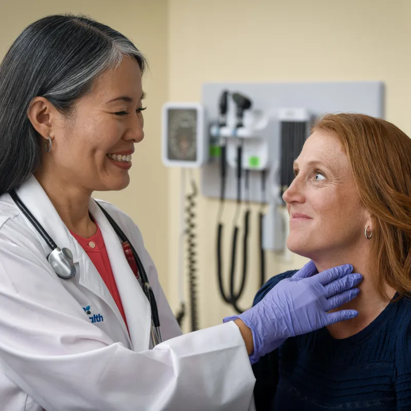 A Provider Does a Physical Exam on Her Patient