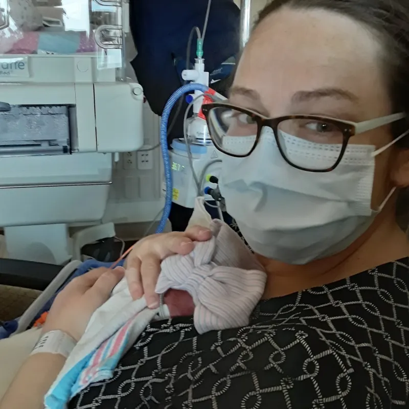 Family relied on video and photo updates from NICU nurses due to COVID-19 restrictions.